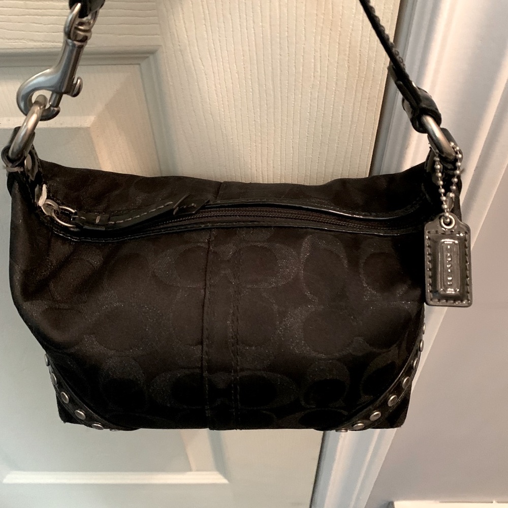 Beautiful black and chrome Coach Purse